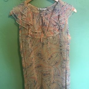 Cabi shell style blouse in size Large.